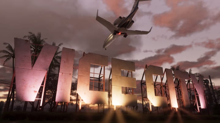 Le panneau Vice City au coucher de soleil, un avion passant au-dessus