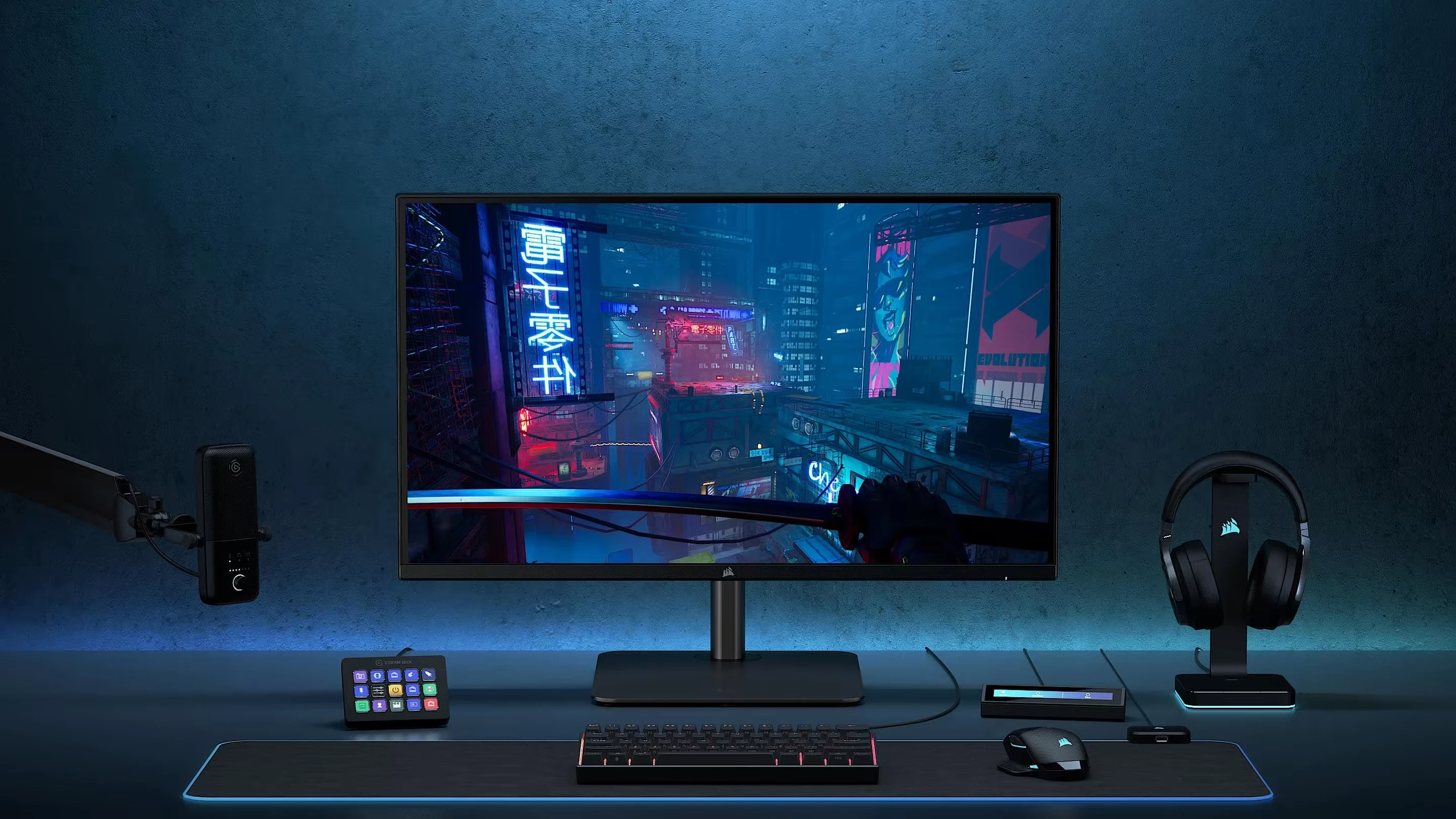 Setup avec moniteur gaming Corsair, clavier, souris, casque et tapis de souris